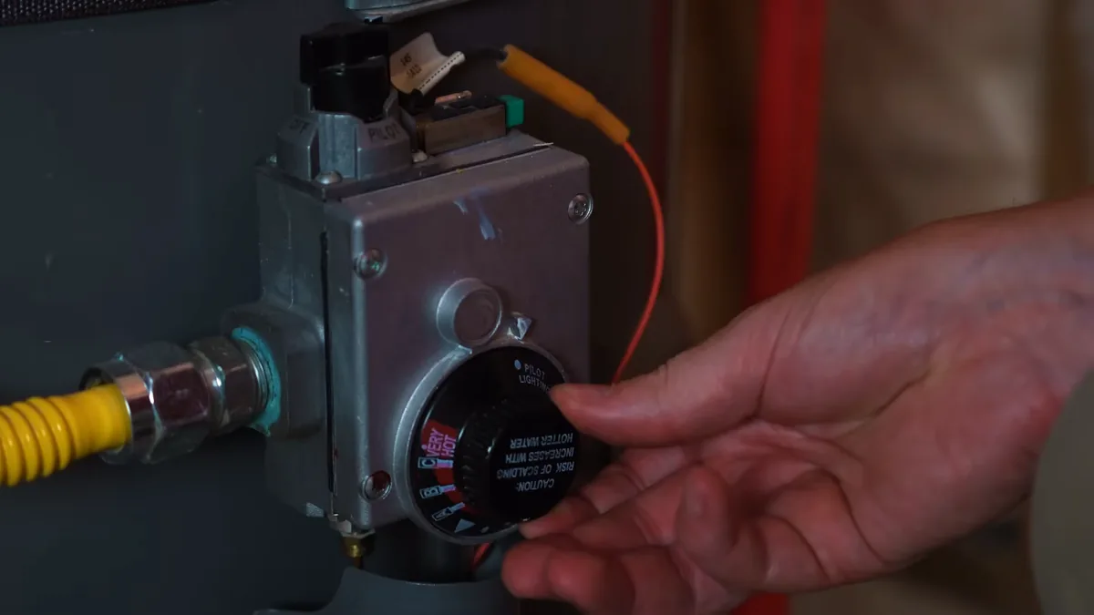 Close view of a gas water heater control dial